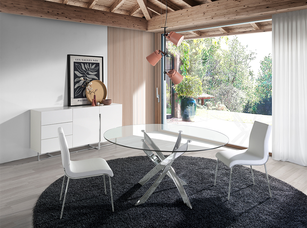 Curved chrome steel and tempered glass dining table Curved chrome steel and tempered glass dining table